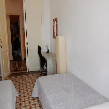 Quarto em Acomodações Particulares Casa Escuela *