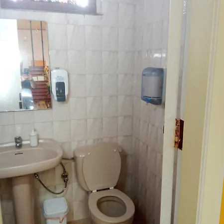 Quarto em Acomodações Particulares Casa Escuela *